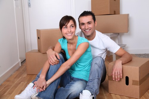 Careful loading of household items during a South Kensington removals job